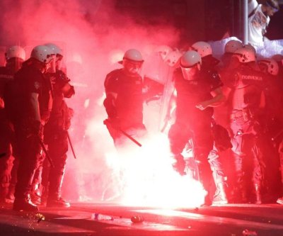 Serbian police clash with anti-government protesters in Belgrade
