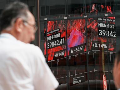 Asian shares are mixed as Trump’s tariff deadline looms, while US stocks set records