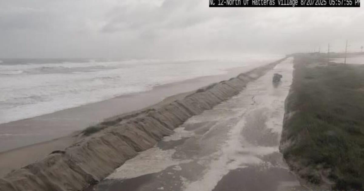 Hurricane Erin stirs up strong winds and floods part of a NC highway