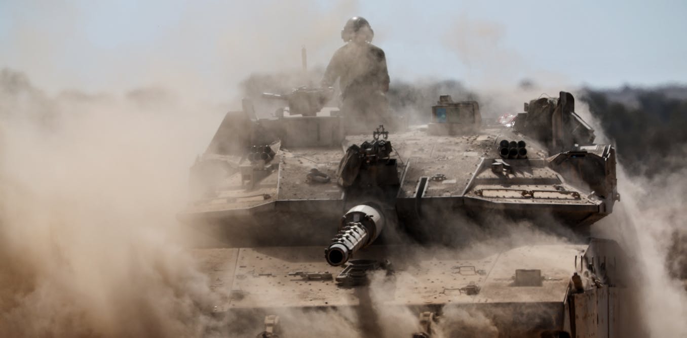 Israel’s call-up of 130,000 reservists raises legal risks for dual citizens and their home countries