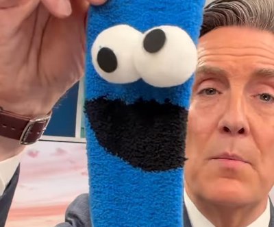 Watch: News anchor’s collection of 1,531 pairs of socks earns world record