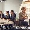 What Defines a Corporation and a Partnership?