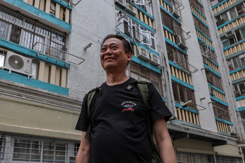 Hong Kong fire victim returns to search for memories of his dog