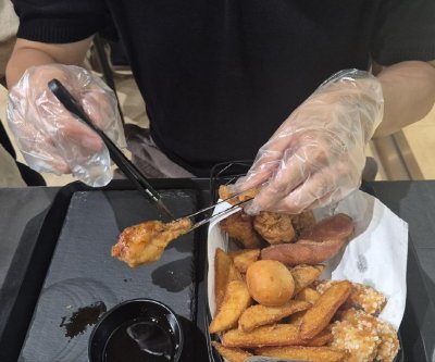 Inside Kyochon’s 72-brushstroke chicken method