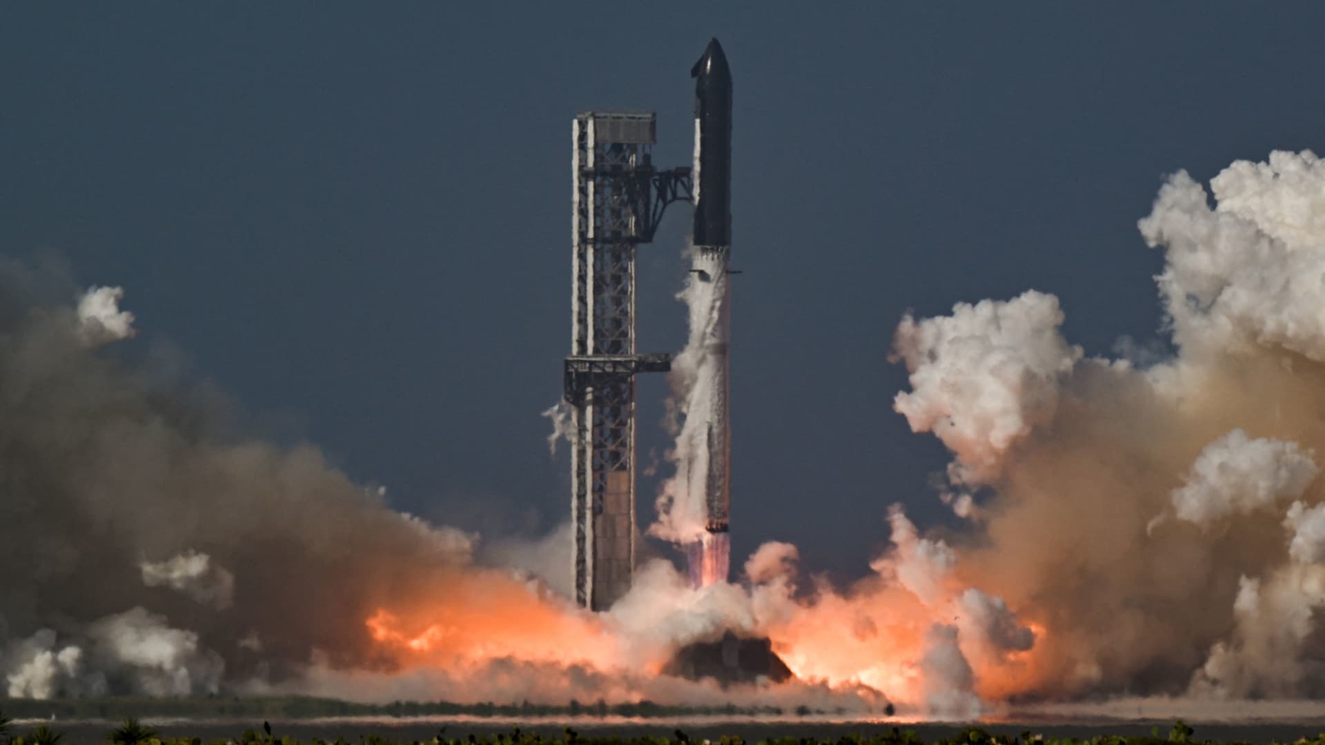 SpaceX launches massive Starship rocket in first test flight since IPO